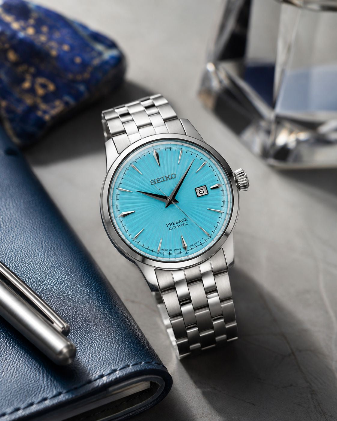 Silver Stainless Steel Automatic Watch with Ice Blue Sunburst Dial