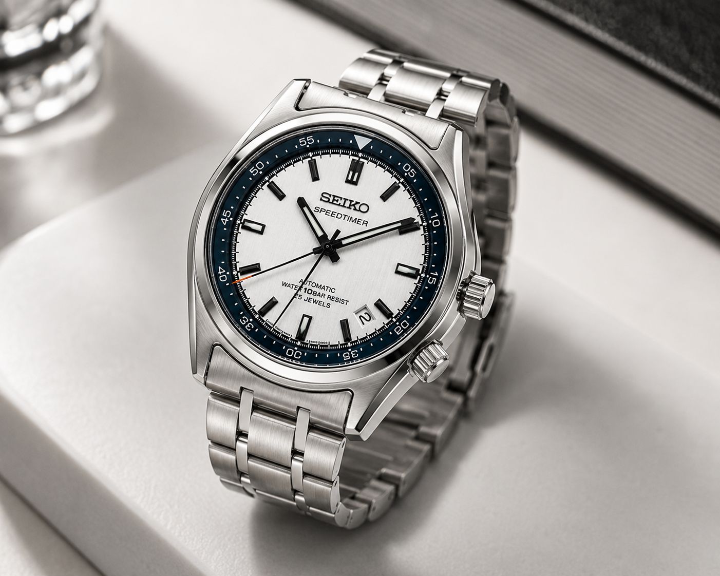 Stainless Steel Automatic Dress Watch with White Dial & Blue Chapter Ring